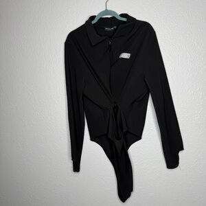 Pretty Little Thing Plus Black Cut Out Zip‎ Detail Rib Bodysuit